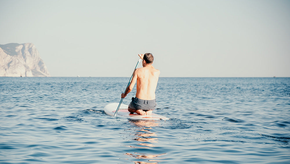 The Health Benefits of Stand-Up Paddleboarding: Fitness and Fun in One