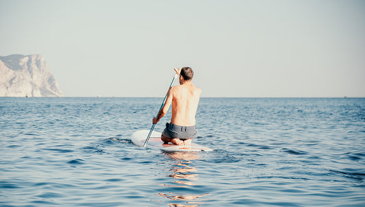 The Health Benefits of Stand-Up Paddleboarding: Fitness and Fun in One